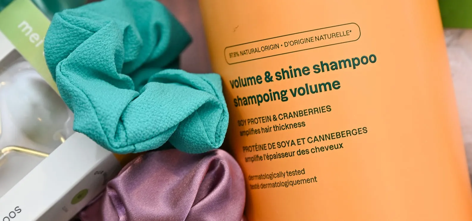 Shampoo that contains soy protein. The label states the product is made with 97.8% natural origin