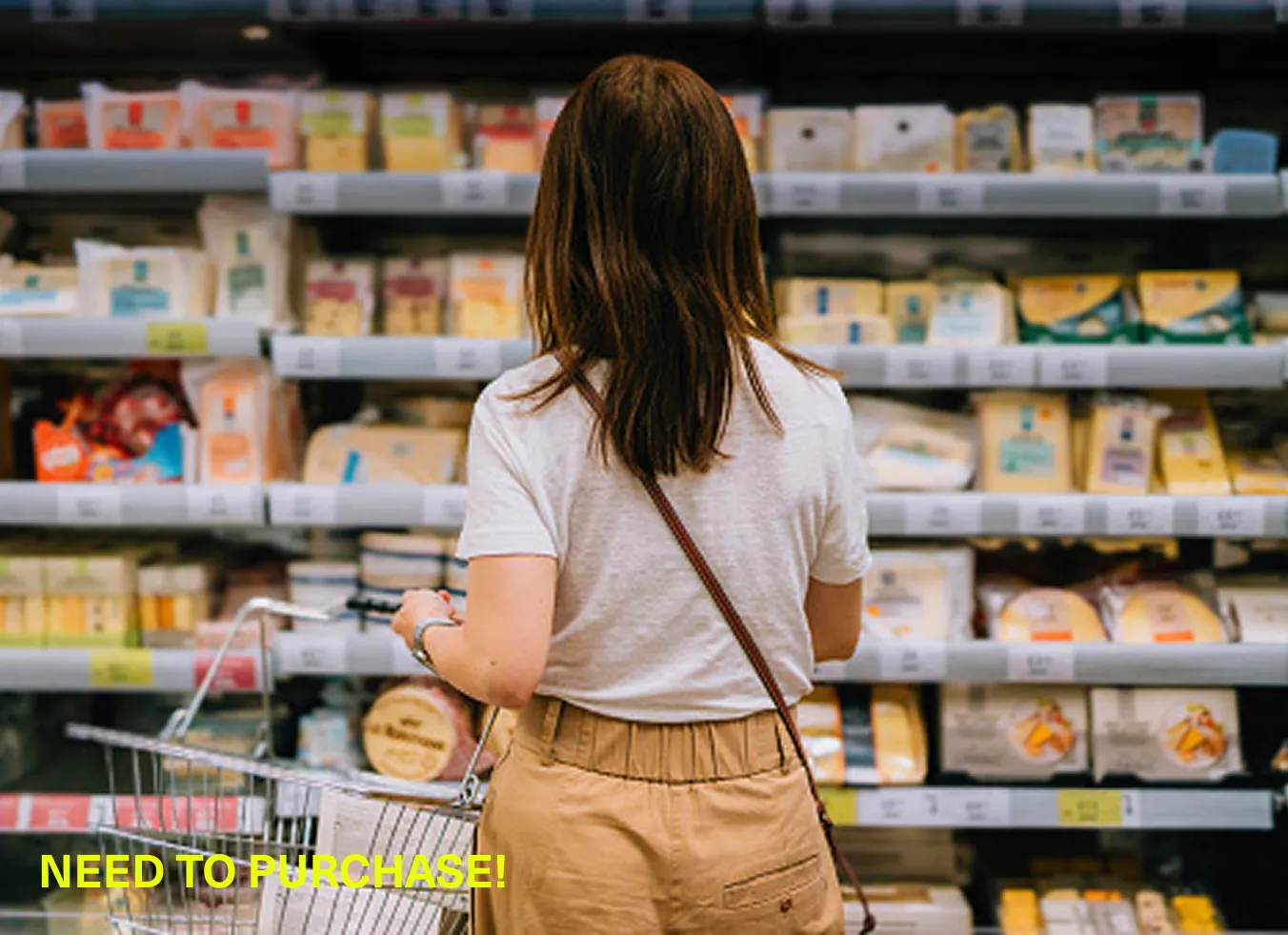 woman with back toward camera in shopping isle